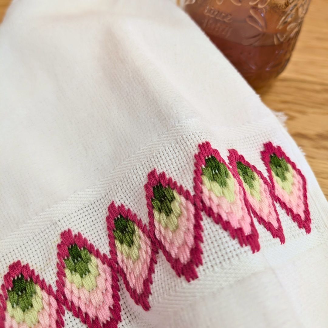Bargello towel in pink and green
